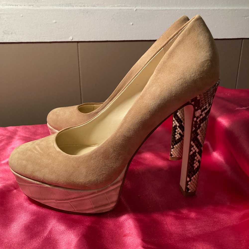 Brand new never worn Jessica Simpson snake skin heels 6 inch heel.